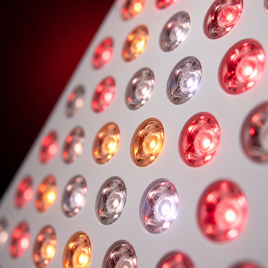 Close-up of the Kivorla 9-Spectrum Red Light Panel LED array with red and amber LEDs lit
