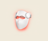 Kivorla 4-Wavelength Laser Mask in white, lit red, side view